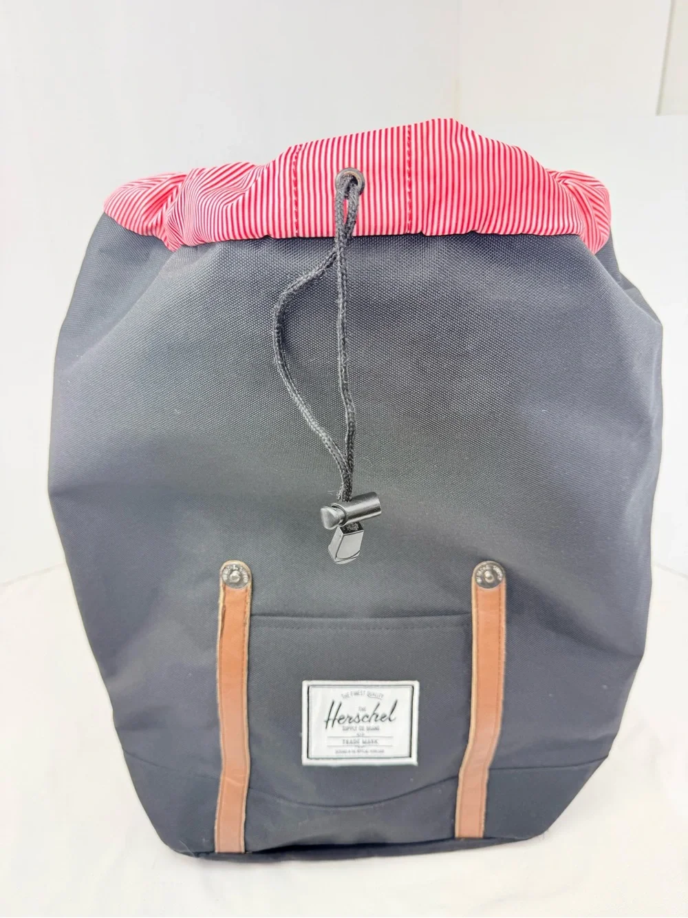 Hershel Retreat Backpack in Black Brown Saddle Canvas with Interior Red Stripe